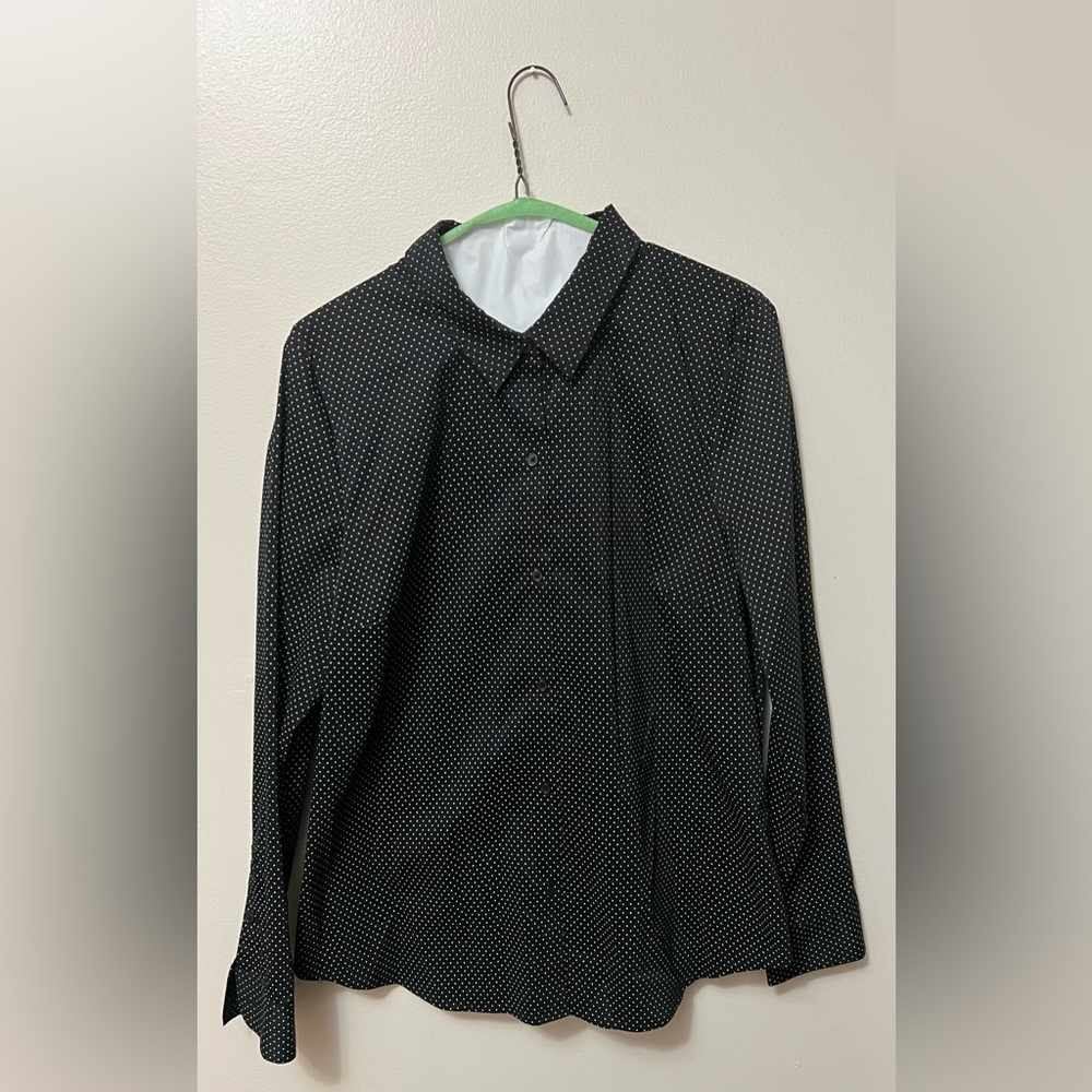 Women’s blouse, size 16 black with little white polka dots.